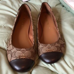 Gently used brown Coach Chelsea flats.
